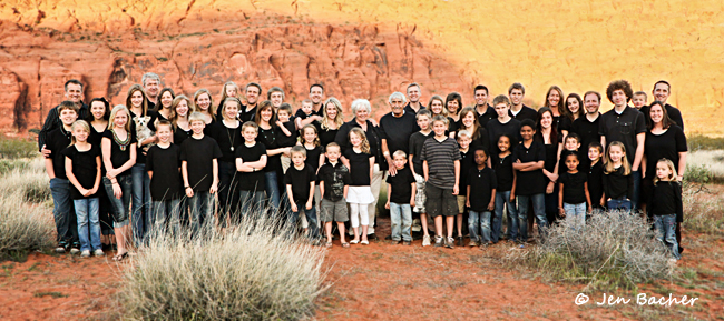 Group family photo everyone matching wearing black shirts